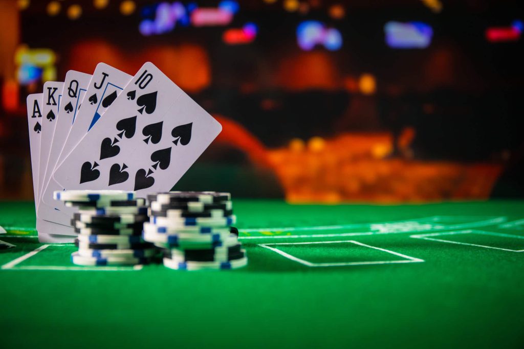 playing-cards-and-poker-chips-on-top-of-a-gambling-table-1024x683.jpg